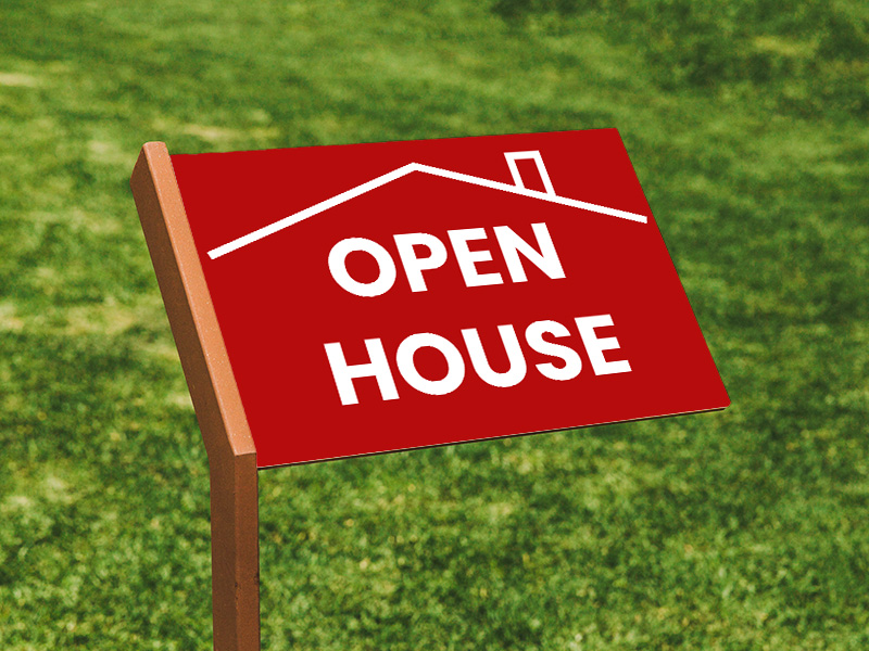 a yard sign with red background and white font color to attract people